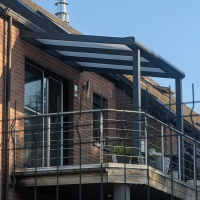 Pergola en aluminium et polycarbonate opalin : installation sur terrasse à Fléron