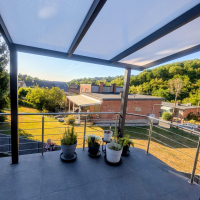 Pergola en aluminium et polycarbonate opalin : installation sur terrasse à Fléron